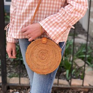 Pink Haley round wicker crossbody